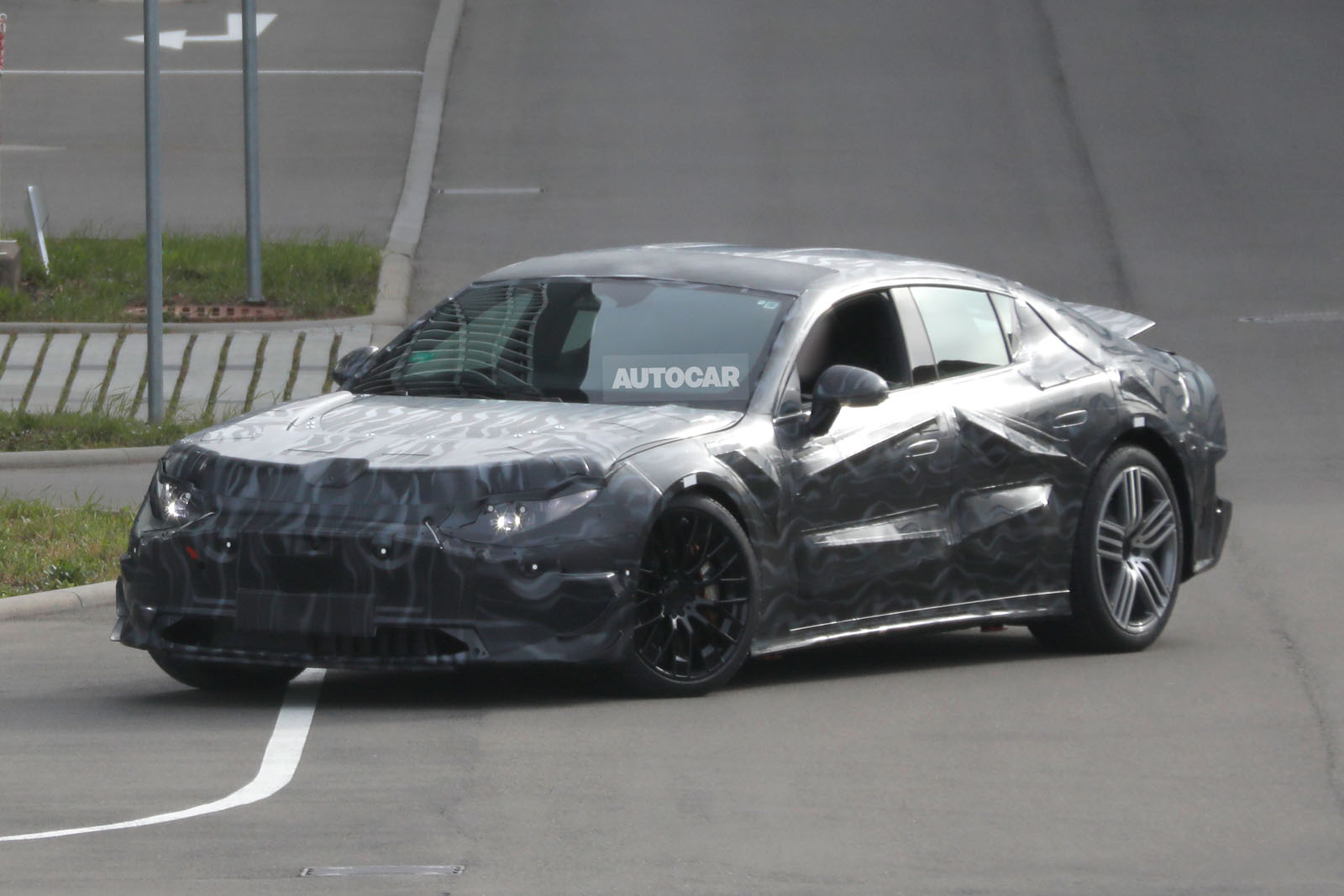 mercedes amg gt saloon ev camo front quarter 2 0